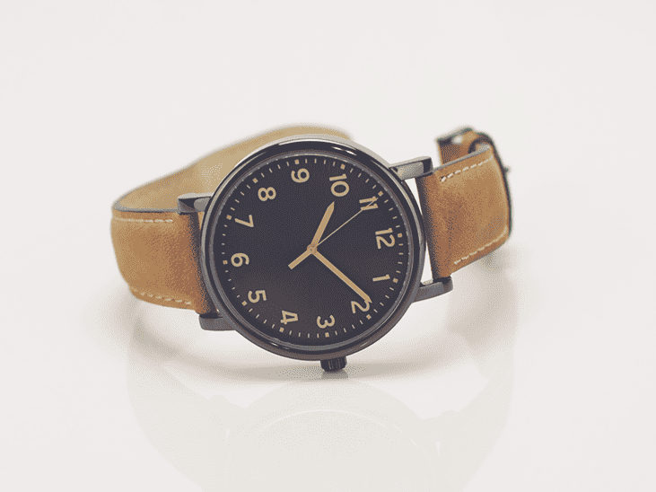 Wristwatch product photo after AI upscaling with a crisp dial and leather strap texture