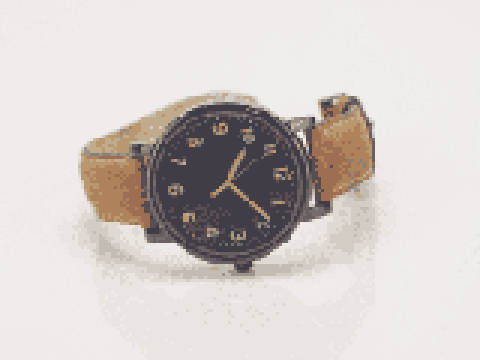 Blurry low-resolution product photo of a wristwatch before upscaling