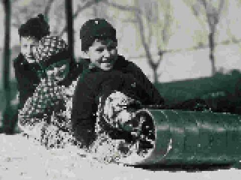 Faded black and white photo of kids on a toboggan before upscaling