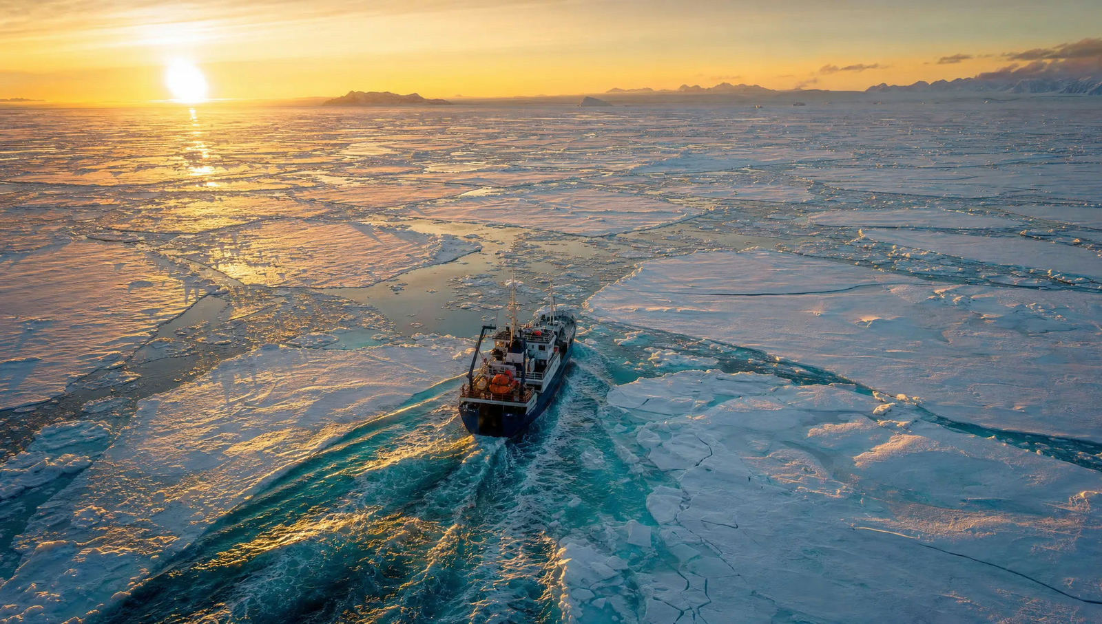 AI-generated aerial view of an icebreaker ship cutting through frozen sea at golden hour